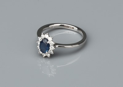 Lot 161 - A Sapphire and Diamond Platinum Star Cluster Ring