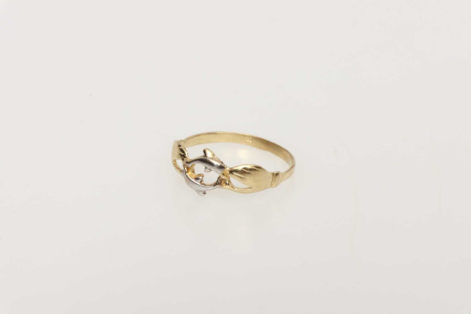 Lot 178 - A Precious Yellow Metal Claddagh Style Dolphin Ring