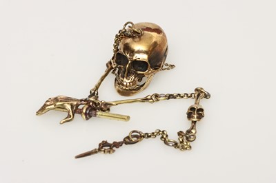 Lot 215 - A Modern Brass Momento Mori Fob Style Chain