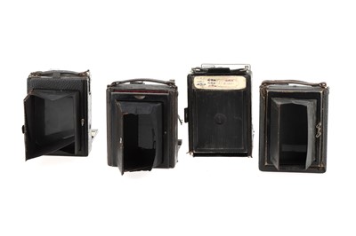 Lot 595 - Four Folding Bed Cameras