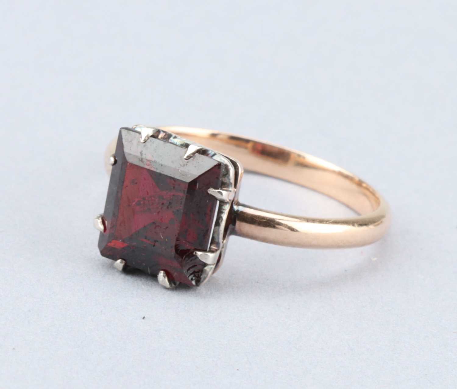 Lot 253 - A Pincess Cut Ruby Solitaire Ring