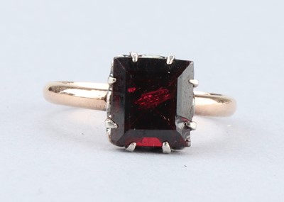 Lot 253 - A Pincess Cut Ruby Solitaire Ring