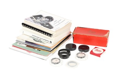 Lot 347 - A Small Selection of Leica Camera Accessories & Literature