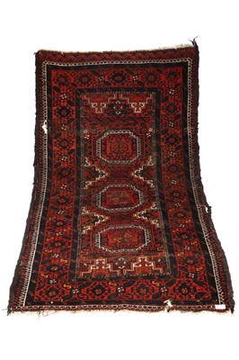 Lot 203 - A Hand-Knotted Persian Carpet