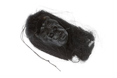 Lot 243 - A Small Box Containing a Novelty Shrunken Head