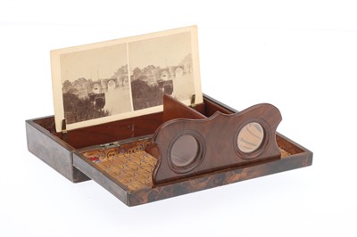 Lot 76 - A Victorian Folding Stereoscope and Stereoviews