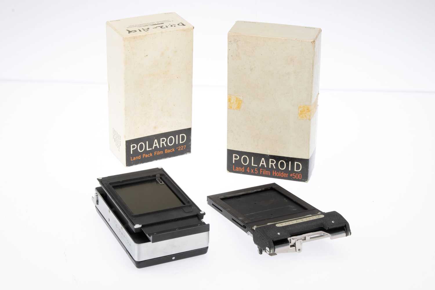 Lot 682 - Two Polaroid Film Backs