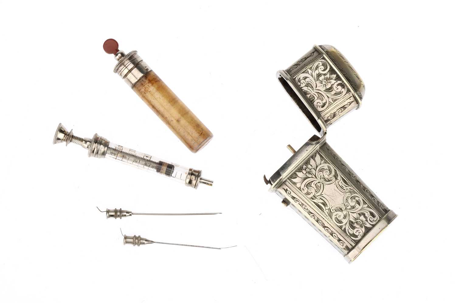 Lot 133 - A Decorative Opiate Syringe Set