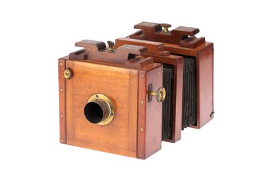 Lot 665 - An Early Watson & Sons Mahogany & Brass Half Plate Studio Rail Camera