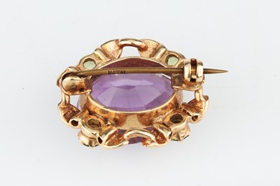 Lot 210 - An Edwardian Oval Cut Amethyst Brooch