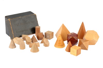 Lot 290 - A Red Marble Cuboctahedron and other  wooden Geometrical Models