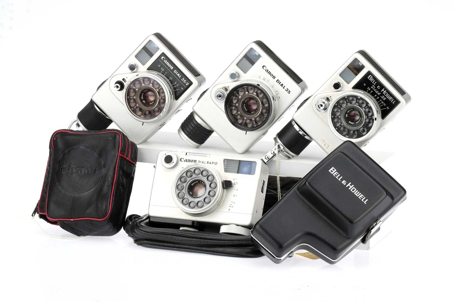 Lot 292 - Four Canon Dial 35 Style Half Frame 35mm