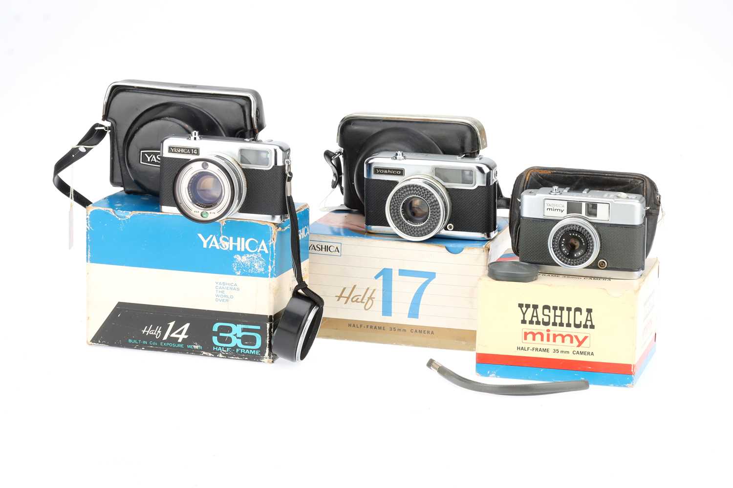 Lot 282 - Three Boxed Yashica Half Frame 35mm Viewfinder Cameras