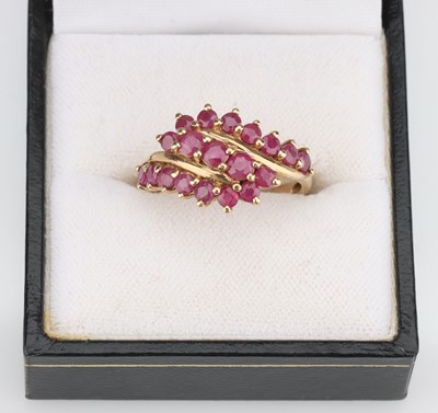 Lot 43 - A 9 ct Gold Ruby Crossover Ring
