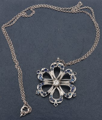 Lot 22 - An 18 ct White Gold Diamond and Sapphire Flowerhead Brooch-Cum-Pendant