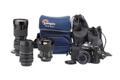 Lot 157 - A Nikon Nikkormat FT3 SLR Camera and Three Vivitar F Mount Lenses