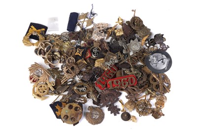 Lot 880 - A Good Collection of WWI & WWII Military Cap Badges