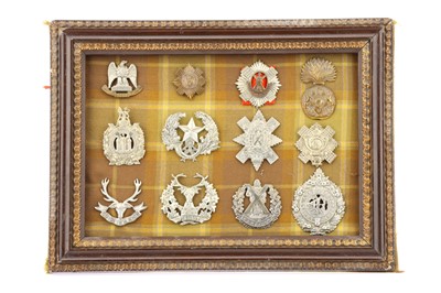 Lot 863 - Two Cased Displays of Military Cap Badges