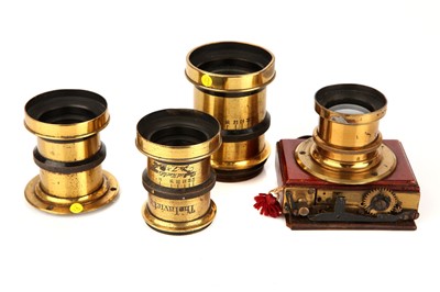 Lot 1373 - Collction of 4 Rapid Rectalinear Brass Bound Lenses