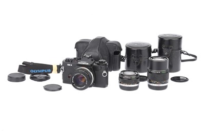 Lot 293 - An Olympus OM-4 35mm SLR  Camera and Lenses