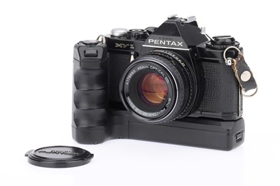 Lot 219 - An Asahi Pentax MV-1 35mm SLR Camera Outfit