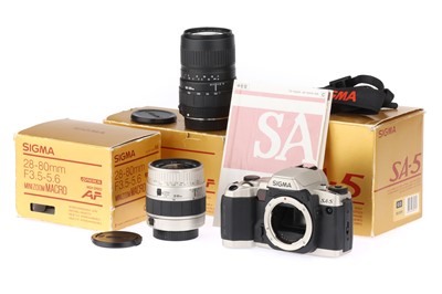 Lot 233 - A Sigma SA-5 35mm SLR Camera and Lenses