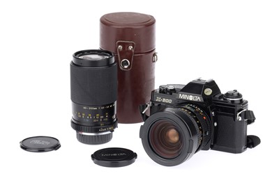 Lot 214 - A Minolta X-300 35mm SLR Camera Outfit