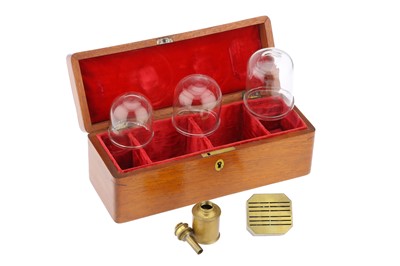 Lot 73 - A Cupping Set by  Evans & Co., London