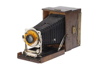 Lot 550 - A Home Made Wooden Folding Bed Camera