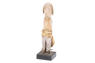 Lot 850 - An African Tribal Urhobo Female Figure with Cloth Skirt