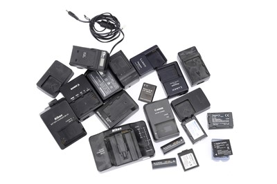 Lot 909 - A Collection of Camera Battery Chargers and Batteries