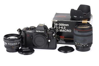 Lot 120A - A Nikon AF Nikkor f/2.8 20mm Camera Lens