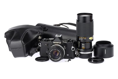 Lot 286A - An Olympus OM-1N 35mm Camera Outfit