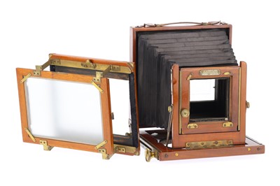 Lot 883 - A Half Plate Mahogany and Brass Field Camera Body