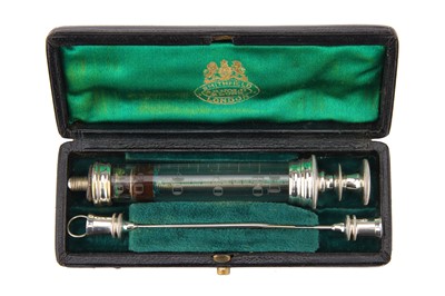 Lot 209 - Four  Antique Hypodermic Syringes