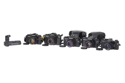 Lot 657 - A Selection of Five Japanese SLR Cameras