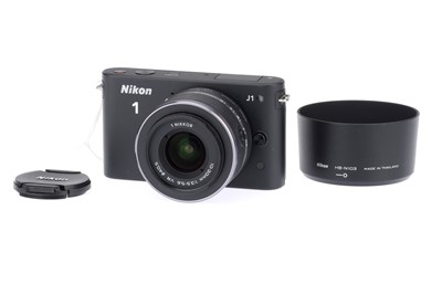 Lot 497 - A Nikon 1 J1 Compact Mirrorless Digital Camera