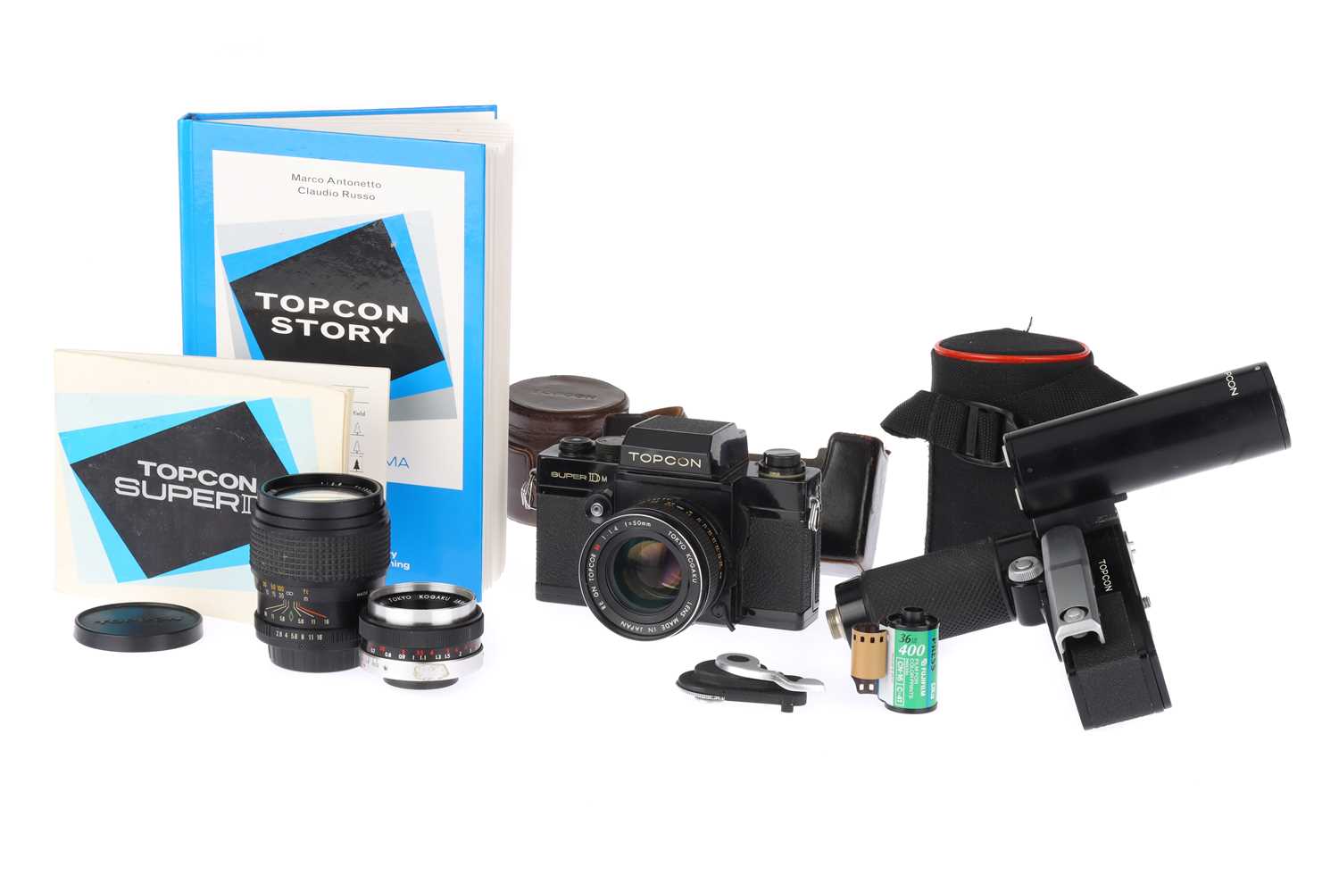 Lot 610 - A Topcon Super DM SLR 35mm Camera and Topcor Lenses