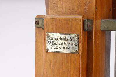 Lot 908 - A Polished Wood Tridod