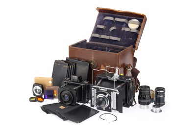 Lot 777 - A Van Neck London and an Ernemann Strut Folding Press Camera