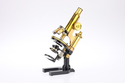 Lot 166 - A Brass & Black Leitz Compound Microscope