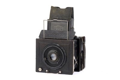 Lot 885 - A Zeiss Ikon Miroflex A Folding 6.5 x 9 SLR Plate Camera