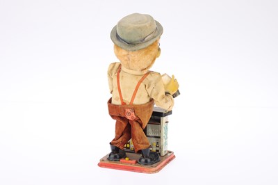 Lot 441 - A Charlie Weaver Bartender Tin Toy