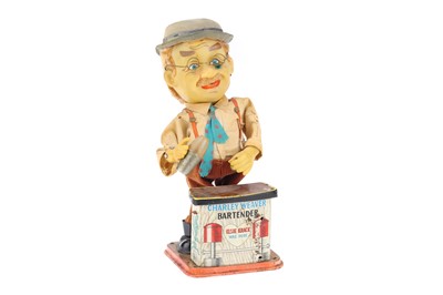 Lot 441 - A Charlie Weaver Bartender Tin Toy