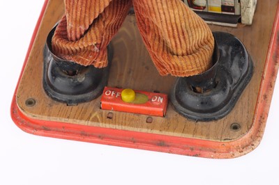 Lot 441 - A Charlie Weaver Bartender Tin Toy