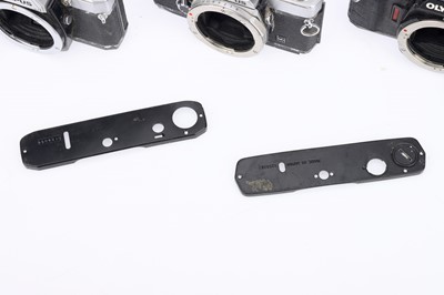 Lot 204 - Five Olympus OM Series Cameras for Parts