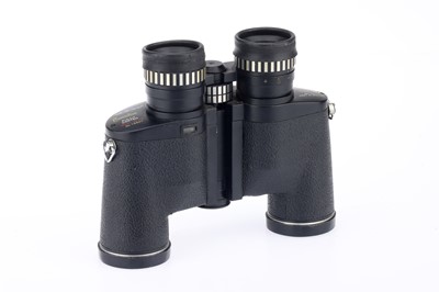 Lot 721 - A Pair of Tasco Executive Electric 7-15 x 35 Binoculars