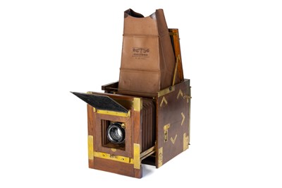 Lot 308 - An Adams & Co.  Tropical Minex de Luxe Half Plate Reflex Camera