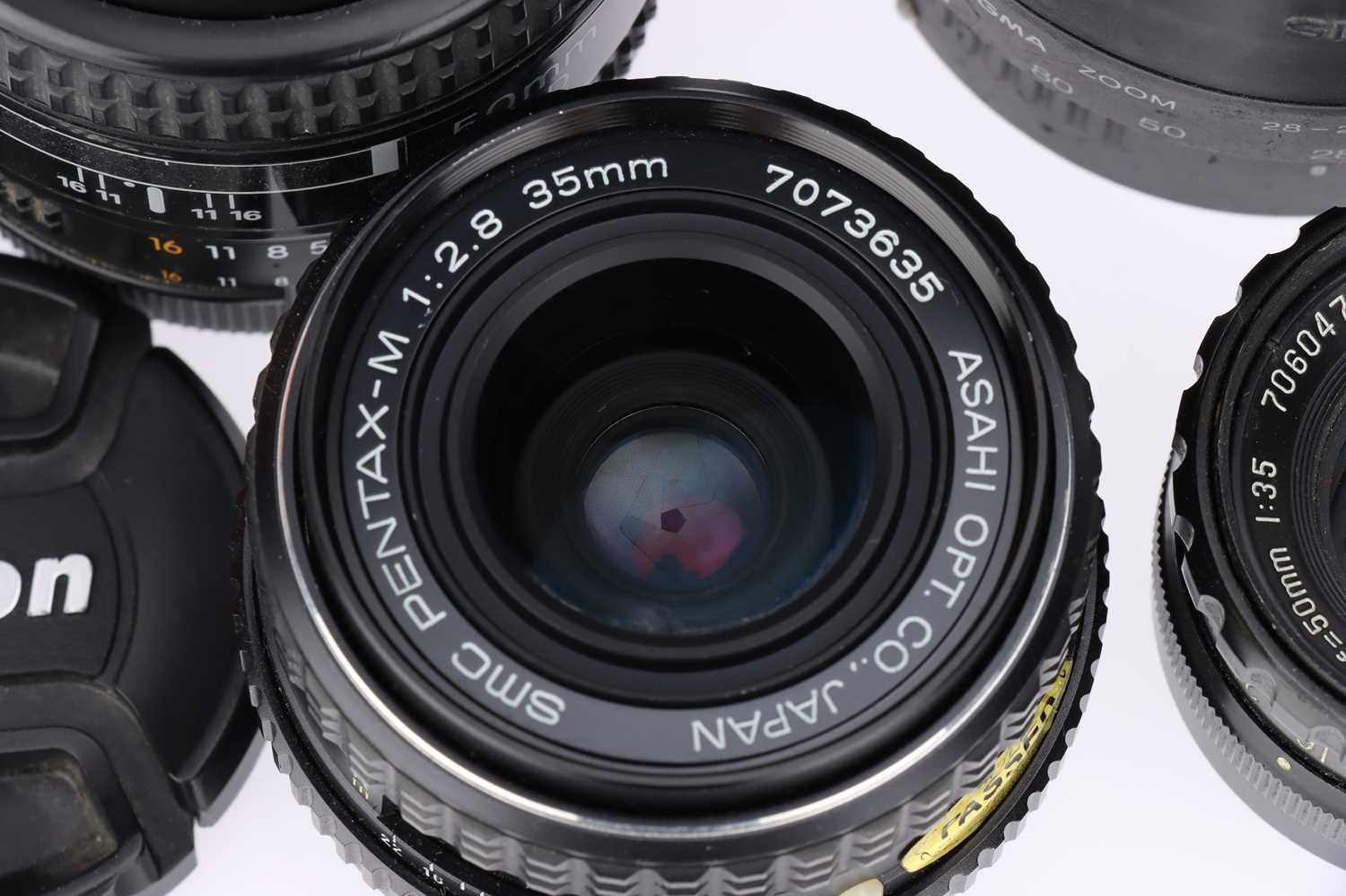 Lot 399 A Selection of Cameras & Lenses,