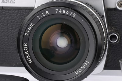 Lot 67 - A Nikon FM2n SLR Camera Outfit